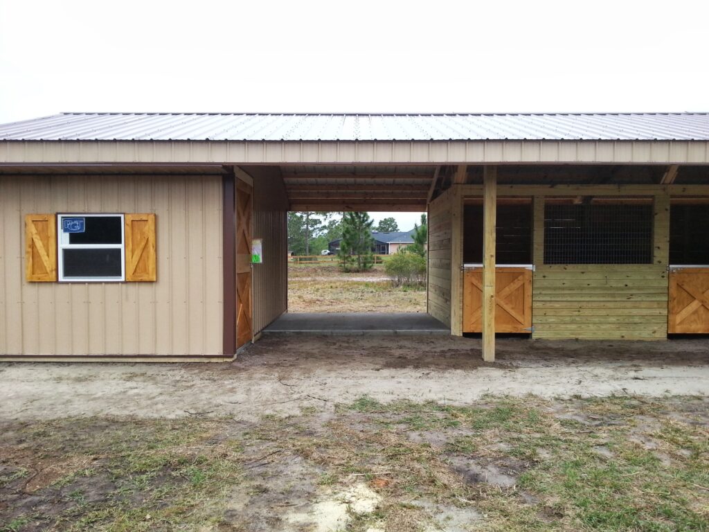 Custom horse barn with dutch stall doors built by Buildings By Bill in Florida